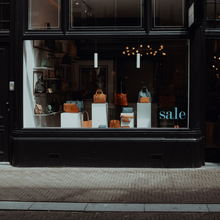 ultra series, strore front with bags in window display
