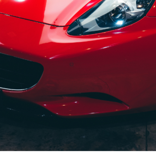 close up of a red car bumper