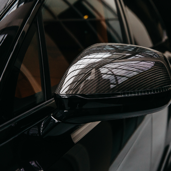 car mirror wrapped in carbon fiber film